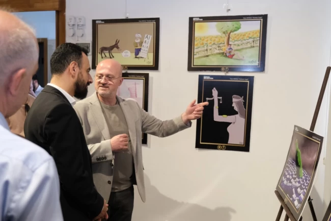 Yalçın Eroğlu'nun ödüllü karikatürleri Bursa İnegöl'de görücüye çıktı