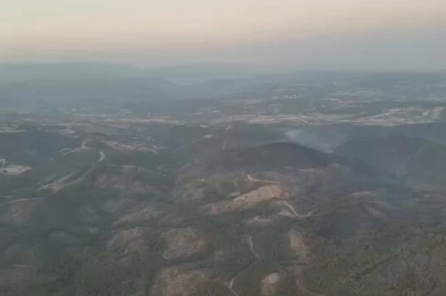 Bursa'da Harmancık Yangını Söndürüldü, Soğutma Çalışmaları Devam Ediyor