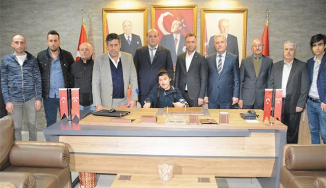 MHP ilçe başkanlığında yüzler gülüyor…