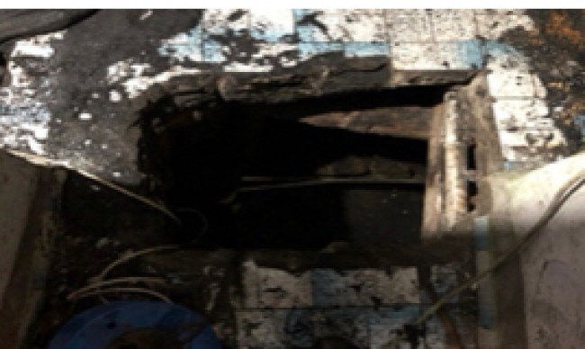 Evini kömür ocağına çevirdi